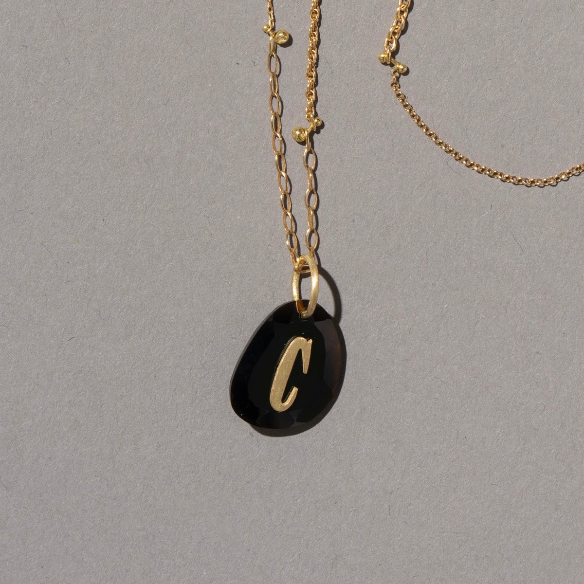 本日まで出品! stones stone zoo ペンダントトップ オニキス】stones stone zoo ペンダントトップ｜BLACK
