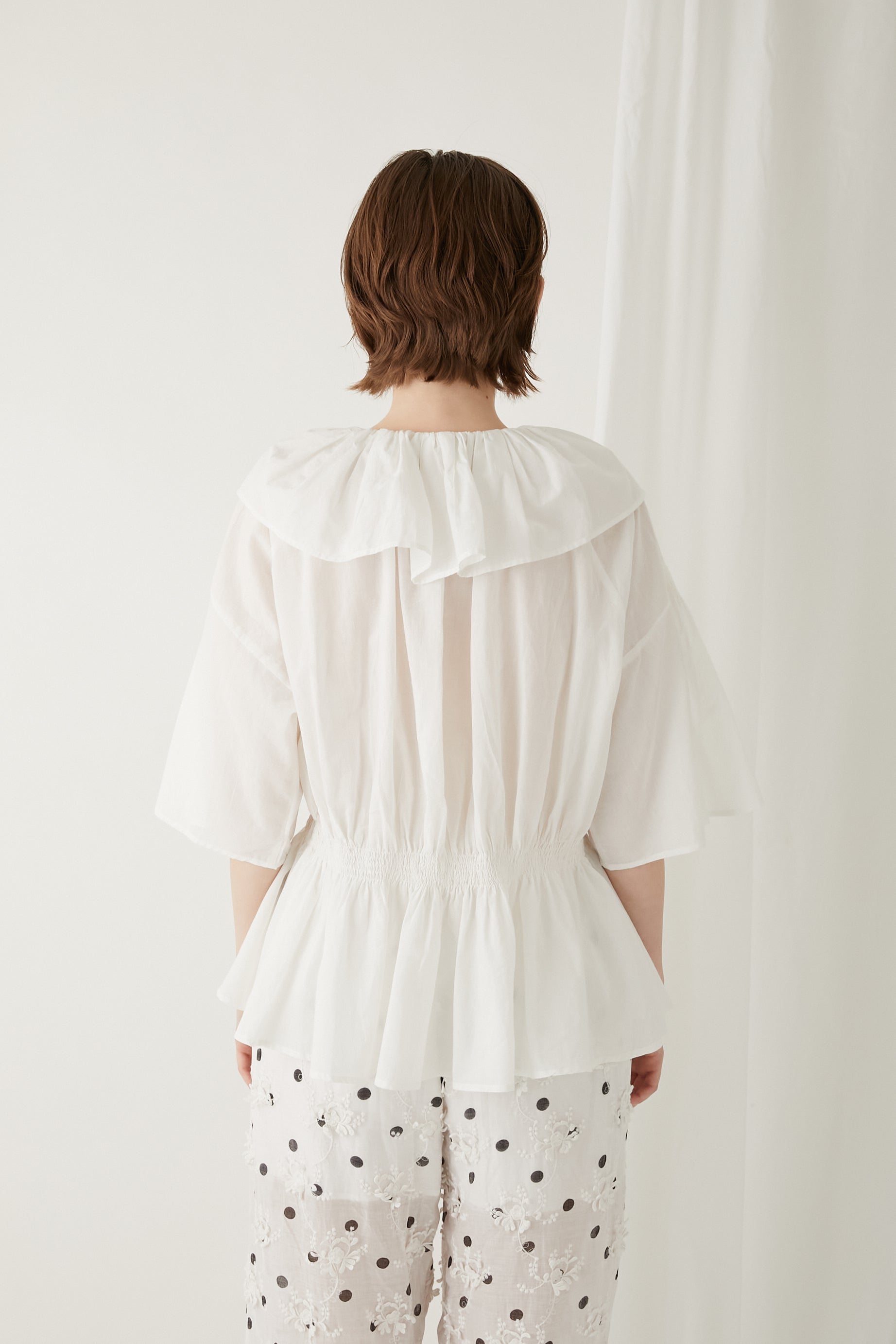 frill volume blouse │ WHITE